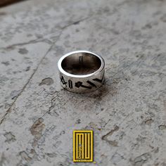 "The Details of the Ring - Wedding Band style - All Masonic Tools - \"Nosce Te Ipsum\" written inside The General Details: Rings are specially designed with Masonic symbols the likes of which have never been seen before. In addition to that, there are also other different symbols on the top and side faces. Our products are not mass-produced. Our products are made entirely in İstanbul Grand Bazaar with traditional methods. It means that all the products are custom designs and they are hand cast w Symbolic Etched Engraved Wedding Ring, Symbolic Etched Wedding Ring, Symbolic Engraved Wedding Ring, Symbolic Wedding Engraved Ring, Different Symbols, Masonic Symbols, Wedding Band Styles, Grand Bazaar, Hand Cast