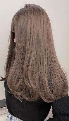 Here are 15 potential cute hair color trends for 2024: Olive Beige Hair, Creamy Brown Hair, Milky Brown Hair, Brown Hair Korean, Beige Hair Color, Light Ash Brown Hair, Cold Hair, New Hair Color Trends, Ash Brown Hair Color