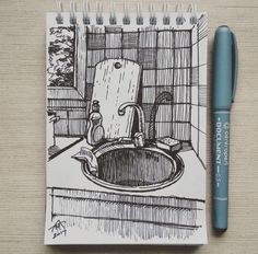 a pen is sitting next to a drawing of a chair in a bathroom sink with the door open