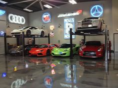 a car showroom filled with different colored cars