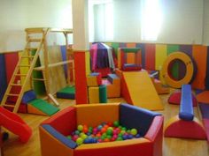 children's play area with soft foam balls and climbing equipment for indoor play areas