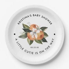 a white plate with oranges and leaves on it that says, krisina's baby shower