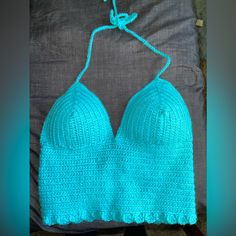 Blue Handmade Crochet Top. Perfect For Summer Or As A Bathing Suit! Brand New, Includes Pads Sewn In For Extra Support. Fits A/B/C Cup And 30-36” Xsmall-Medium I Have Other Colors And Styles On My Page! Perfect For Summer And The Beach! Ready To Be Shipped. Look At The Last Pictures For Reference Handmade Blue Cotton Crochet Top, Blue Fitted Halter Neck Crop Top, Blue Fitted Triangle Halter Top, Fitted Light Blue Crop Top For Beach, Blue Crochet Crop Top For Beach, Blue Crochet Cotton Crop Top, Blue Crochet Sleeveless Crop Top, Fitted Blue Crochet Crop Top, Blue Fitted Crochet Crop Top