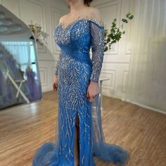 Stunning Dubai Blue Mermaid Evening Dress - Sexy High Split with Skirt Beaded Gown for Women's Wedding Party 2024 Blue Mermaid Hem Evening Dress For Banquet, Glamorous Blue Mermaid Hem Evening Dress, Glamorous Blue Mermaid Dress For Banquet, Blue Long Sleeve Glamorous Mermaid Dress, Glamorous Blue Gown With Mermaid Hem, Blue Glamorous Evening Dress With Sweep Train, Glamorous Blue Evening Dress With Sweep Train, Blue Evening Dress With Rhinestones For Prom, Blue Rhinestone Evening Dress For Prom