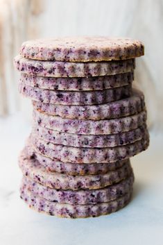 a stack of cookies sitting on top of a white counter