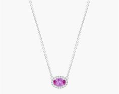 18K White Gold East West Set Oval Halo Pink Sapphire and Diamond Necklace (6x4mm). Celebrate a classic look with this necklace featuring an east-west set pink sapphire oval surrounded by a halo of diamonds and a signature clasp for a perfect adjustable fit. This chic necklace will instantly upgrade any look with a touch of luxury. Elegant Pink Sapphire Necklace For Formal Occasions, Oval Pink Sapphire Jewelry In White Gold, Oval Pink Sapphire White Gold Jewelry, Chic Necklace, East West, Pink Sapphire, Gemstone Necklace, Classic Looks, Pendant Jewelry