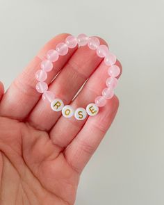 Popular Right Now, Adorable Beautiful Natural Rose Quartz Gemstone, Single bracelet with Pink colored Quartz Matte Natural Gemstone Beads and a custom word of your choosing. Can Be Used as Ankle Bracelet. Also available in Adult Sizes. Customizable worded bracelet stacks. Perfect for birthdays, gender reveals, baby announcements, mamas and their babes, Valentine's Gift, Best Friends, Easter,... Dress up your outfit with these sweet customizable, sentimental bracelets! Comes in a baby pink drawst Apple Watch Bands Fashion, Girls Bracelet, Cadeau Baby Shower, Rose Bracelet, Pink Rose Quartz, Baby Bracelet, Baby Jewelry, Rose Quartz Gemstone, Name Bracelet