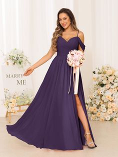 a bridesmaid in a purple dress holding a bouquet and posing for the camera