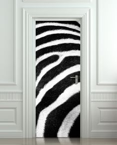 an open door with a black and white zebra print