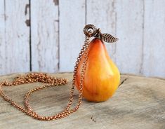 "Long charm necklace with yellow pear pendant, Cute gift jewelry for vegan pear 2\"x 1\" (5x3cm) chain 32\" (80cm) more fruit jewelry https://www.etsy.com/listing/496706714/chunky-charm-pendant-long-boho-necklace?ref=shop_home_active_1 Please, keep the jewellery away from perfume and other alcohol containing fluids because the alcohol damages the Polymer clay. Store the fragile items in separate boxes and treat them with care. Misuse may result in damage. Visit my shop https://www.etsy.com/shop/ Orange Pear-shaped Jewelry For Gifts, Pear-shaped Orange Jewelry Gift, Yellow Teardrop Necklace For Gifts, Handmade Pear-shaped Necklace For Gift, Handmade Pear-shaped Necklace Gift, Pear-shaped Yellow Necklace For Gift, Pear Pendant, Long Necklace Boho, Yellow Fruit