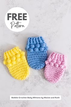 three crocheted baby mittens made and knitted with free pattern on top