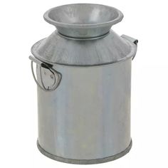 a large metal pot with a handle on it