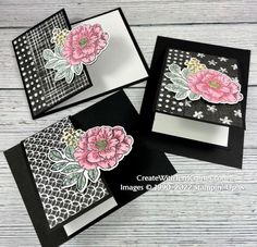 three cards with flowers on them sitting next to each other, one is black and white