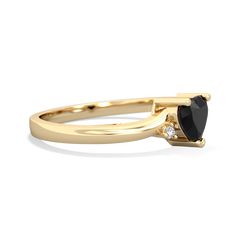 Delicate and dainty, this 14K Yellow Gold ring is a lovely way to express the love within you. A heart shaped pure black black onyx is the focus of this ring, with two sparkling diamonds. It creates an elegant look that is not overstated, and is beautiful on the hand. It is perfect as an everyday ring and an excellent choice for a promise ring as well. Classic 14k Gold Heart-shaped Birthstone Ring, Classic 14k Gold Heart Ring With Gemstone, Elegant 14k Gold Heart-shaped Birthstone Ring, Elegant Heart-shaped Birthstone Ring In 14k Gold, Elegant Heart-shaped 14k Gold Birthstone Ring, Black Ring With Single Diamond In Fine Jewelry Style, Black Ring With Single Diamond, Elegant Black Ring With Single Diamond, Elegant Heart Shaped Sapphire Ring For Formal Occasions