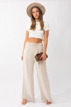 Take yourself to the beach in comfort and style with our Take me to the beach pants! These linen pants are lined for a cozy fit, and feature an elastic waistband and pockets for convenience. Look great and feel fabulous while soaking in the sun's rays! Beige Beachwear Bottoms For Vacation, Beige Beach Season Bottoms For Vacation, Beige Bottoms For Beach Season Vacation, Beige Beach Season Vacation Bottoms, Summer Beachwear Wide Leg Pants For Day Out, Beach Wide Leg Pants For Spring And Summer, Casual Linen Bottoms For Beach Season, Trendy Wide Leg Pants With Pockets For Vacation, Trendy Cotton Wide Leg Pants For Vacation