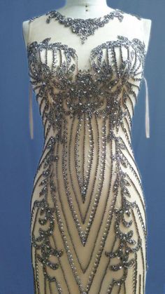 Art Deco Aline Wedding Dress, Art Deco Wedding Gown Tulle, Luxury Rhinestone Fringe Wedding Dress, Luxury Embellished Wedding Dress With Traditional Drape, Luxury Embellished Champagne Gown, Luxury Champagne Gown For Gala, Luxury Banquet Dresses With Beaded Straps, Luxury Pearl Embroidered Wedding Dress For Reception, Luxury Silk Embroidered Wedding Dress