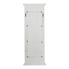 a tall white cabinet sitting on top of a white floor