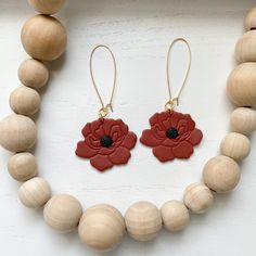 Handmade polymer clay earrings Clay flower dangle earrings Clay poppy flower earrings Handmade poppy floral clay earrings. These clay poppy earrings are created from high quality clay and are nickel free. These earrings are super lightweight! They also make the perfect boho statement earrings! * Nickel Free * Super Lightweight * Each pair of earrings is handmade and uniquely designed! No two are alike! CARE INSTRUCTIONS: Handle earrings with care. Polymer clay is flexible and durable, but can br Flower-shaped Polymer Clay Earrings With Ear Wire, Flower Shaped Polymer Clay Earrings With Ear Wire, Adjustable Polymer Clay Flower Earrings, Everyday Polymer Clay Dangle Flower Earrings, Everyday Dangle Polymer Clay Flower Earrings, Nickel-free Flower-shaped Polymer Clay Earrings, Dangle Earrings With Flower Charm In Polymer Clay, Everyday Dangle Flower Earrings In Polymer Clay, Adjustable Polymer Clay Earrings With 3d Flowers