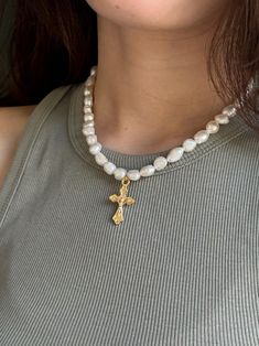 🌟 Crusader Pearl Cross Necklace | Elegant Pearl Jewelry Discover the allure of our Crusader-inspired pearl cross necklace: Authentic pearls exuding elegance Detailed with a gold plated brass cross and clasp Adjustable length: 38-45 cm for a perfect fit Pearls exhibit varying sizes and shapes, enhancing uniqueness 🌿 Care Instructions: Delicate and elegant, these products require gentle handling to prevent breakage. Make sure it is properly cleaned, polished, and stored away from water, chlorine, or chemicals such as perfumes or lotions. 🔨 Handcrafted Excellence: Each piece is meticulously handcrafted and made to order, ensuring uniqueness and minor differences that enhance its charm. 📦 Shipping Details: Enjoy worldwide shipping! Each order is carefully hand-packed, promising a delightfu Gold Cross Necklace With Pearl Chain, Gold Cross Necklace With Pearl Pendant, Gold Necklaces With Pearl Chain And Cross Pendant, Gold Necklace With Pearl Chain And Cross Pendant, Elegant Pearl Crucifix Necklace, Elegant Crucifix Pearl Necklace, Elegant Crucifix Pearl Pendant Necklace, Elegant Crucifix Necklace With Pearl Pendant, Pearl Necklace With Cross Pendant