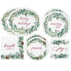 four paper plates decorated with holly wreaths and merry lettering