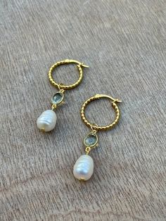 Beautiful Freshwater Pearls and Green Amethyst on 20mm Gold Vermeil beaded effect hoops. Earrings are fitted with latch pierced ear fitting.  I've shown a photo to show what the hoops look like on the ears, however they are not the finished earrings for sale on this listing. Vermeil is Sterling Silver plated with 18ct Gold. Wedding service: The earrings are perfect for a wedding whether it be for the bride herself, bridesmaids or mother/mother in law of the bride. Please message me for prices of wedding packages as discount is available if ordering over a certain amount of pieces. Take the stress away by sharing my shop with your wedding party so that they can choose jewellery themselves. All jewellery comes with boxed packaging. Elegant Hoop Earrings With Faceted Beads, Small Hoop Jewelry With Faceted Beads For Gifts, Small Hoop Earrings With Faceted Beads For Gift, Hoop Jewelry With Faceted Beads For Gifts, Wedding Drop Earrings With Faceted Beads, Gift Teardrop Hoop Earrings With Faceted Beads, Wedding Dangle Jewelry With Faceted Beads, Golf Jewelry, Long Silver Earrings