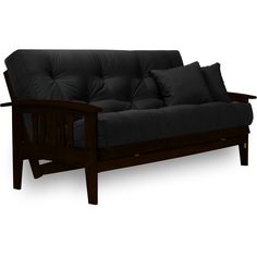 a black futon couch with two pillows on it's back and armrests