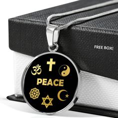 "This Peace Coexist Interfaith Necklace Is the Perfect Gift Whether for Yourself or a Loved One. ➜ Our jewelry is made of high-quality surgical steel with a shatterproof liquid glass coating and an 18k gold finish option. ➜ Engrave onto the back of the Peace Coexist Interfaith pendant your loved one's name, your wedding date, an anniversary, or anything else you want to remember and keep you close to her heart. You can add 2 lines and each up to 20 characters long. Each personalized Peace Coexis Spiritual Stainless Steel Nickel-free Jewelry, Metal Necklace With Polished Finish For Gift, Polished Metal Necklace For Gift, Symbolic Tarnish Resistant Stainless Steel Necklaces, Symbolic Tarnish Resistant Stainless Steel Necklace, Symbolic Stainless Steel Tarnish Resistant Necklace, Spiritual Stainless Steel Jewelry For Gifts, Symbolic Personalized Stainless Steel Jewelry, Personalized Symbolic Stainless Steel Jewelry