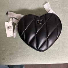 Nwt Coach Heart Bag In Black Quilted Napa Leather. Perfect Condition! Some Smudges Noted On The Leather. Gunmetal Hardware, Double Zip Closure, Crossbody Adjustable Leather Strap, Hangtag And Dust Bag Included. Heart-shaped Leather Shoulder Bag, Leather Heart-shaped Bag With Detachable Strap, Leather Heart-shaped Bag With Adjustable Strap, Leather Bags With Adjustable Strap For Valentine's Day, Heart-shaped Leather Evening Shoulder Bag, Evening Heart-shaped Leather Shoulder Bag, Leather Shoulder Bag For Valentine's Day Evening, Everyday Use Heart-shaped Leather Shoulder Bag, Leather Shoulder Bag For Evening And Valentine's Day