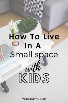 a small table with flowers on it and the words how to live in a small space with kids