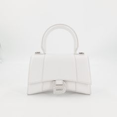 Stunning Bag. Brand New. 100% Authentic. White Xs Balenciaga Bag. With Beautiful Crystals On Buckle. Questions? Leave A Comment Below Balenciaga Hourglass Bag, Balenciaga Top, White Balenciaga, Cristóbal Balenciaga, Balenciaga Bag, Work Bags, Balenciaga City Bag, Handle Bag, Canvas Leather