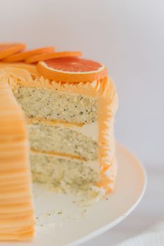 there is a cake with orange slices on it