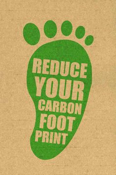 a cardboard box with a green imprint on it that says reduce your carbon foot print