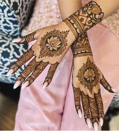 henna tattoo on the hands of a woman