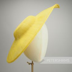 Get Royal Ascot ready with this extra large pointed tip Yellow sinamay fascinator base! Made from a triple layer of stiffened sinamay millinery fabric and is ideal for making an instant hat. This shape has a lovely pointed tip and a shallow crown. Get creative by positioning it at different angles on the head! Just add a headband for securing to the head (not included but available in our shop!) *This is not a fitted hat! You will need to sew in a headband or comb to attach it to your head* Meas Fitted Hats With Pinched Crown For Summer, Fitted Summer Hats With Pinched Crown, Fitted Summer Hat With Pinched Crown, Fitted Sinamay Boater Hat With Short Brim, Sinamay Fascinator With Curved Brim For Royal Ascot, Summer Fascinator With Structured Crown In Sinamay, Spring Fascinator With Sinamay And Curved Brim, Brimmed Sinamay Fascinator For Church, Summer Sinamay Fascinator With Structured Crown