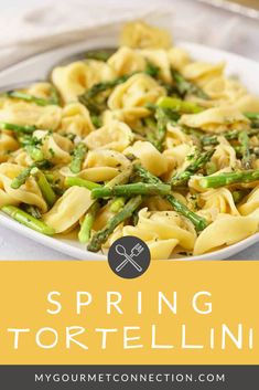 pasta with asparagus and lemon tortelli in a white bowl on a table