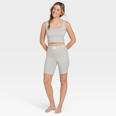 We’re taking comfy and cute to the next level with the Jockey Generation® Cotton Stretch Cropped Tank. Made of a soft cotton blend with just a hint of stretch, this everyday fav feels just as great as it looks. The trendy cropped cut and relaxed styling offer up major versatility—paired with your favorite joggers for chill days at home or layered with a cardigan and jeans for a casual night out ... the options are endless! Like every Jockey Generation® product, the Cotton Stretch Cropped Tank is Basic Gray Activewear For Loungewear, Casual Fitted Tops For Lounging, Cozy Fit Basic Top For Loungewear, Cozy Cotton Activewear For Lounging, Casual Ribbed Sleepwear In Solid Color, Cozy Cotton Activewear For Relaxation, Casual Ribbed Sleepwear, Casual Ribbed Solid Color Sleepwear, Casual Solid Ribbed Sleepwear