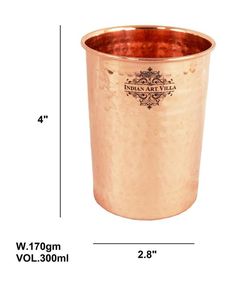 a large metal cup is shown with measurements