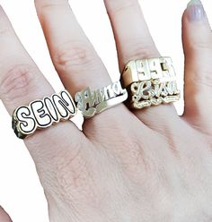 Christmas gift name ring in sterling silver or gold over silver is perfect statement ring for you. Use this modern name ring also as a knuckle ring (go one size smaller than your regular finger size) or as a Pinkie ring. Gold name ring comes as a desired word/phrase with a single or two separate rings. 1. Team name. 2. Group name. 3. Sports team name. 4. MEN NAME and many more....( contact me for more info) 5. A.K.A names. All my beautiful name rings and other pieces are proudly made in USA! **C Customized Open Promise Ring, Customized Nameplate Rings For Anniversary, Customized Open Ring For Promise, Customized Gold Open Ring, Customized Gold Engraved Promise Ring, Gold Promise Ring With Custom Name, Gold Engraved Open Ring With Name, Custom Nameplate Ring For Promise, Gold Open Ring Jewelry With Custom Name