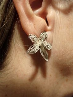 Maltese Filigree Flower Earrings. hand made in the 1970s. Clip ons. beuatiful Silver work. I have taken close ups so you can see the work. Easy to put on and the clips are still strong. Very pretty and unusual. They were bought as a gift for my Mum from my Dad, so I know their history but even though they are 1970s, they are still very pretty for today. They have the Silver mark on the clips. Please see the photos. Handmade Flower Earrings For Formal Occasions, Formal Handmade Flower Earrings, Traditional Pierced Flower Jewelry, Unique Flower-shaped Pierced Earrings, Vintage Flower-shaped Clip-on Earrings, Vintage Flower-shaped Pierced Earrings, Vintage Flower-shaped Pierced Jewelry, Handmade Flower-shaped Earrings For Anniversary, Handmade Flower Shaped Earrings For Anniversary