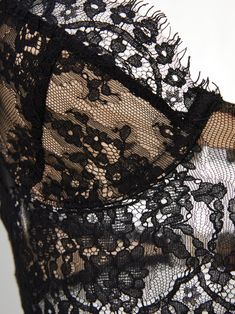 Details This corset-like top is crafted from rich romantic lace with slender strechy straps. It is essential for a sultry night spent with someone special! Body: 55% cotton, 45% nylon Contrast: 92% polyester, 8% spandex Lining 1: 100% nylon Lining 2: 100% polyester Dry clean Size & Fit Size Cup S 70A/70B/70C/75A M 70D/75B/75C/80A L 75D/80B/80C/85A Shipping & Return Free US shipping on orders over $100.Free International shipping on orders over $300. For more details click HERE. Party Camisole With Sweetheart Neckline And Built-in Bra, Lace Corset With Sweetheart Neckline And Built-in Bra, Elegant Black Lace Top With Built-in Bra, Sleeveless Lace Corset With Built-in Bra, Fitted Lace Camisole With Built-in Bra, Evening Underbust Corset With Lace Trim, Sweetheart Neckline Lace Corset, Fitted Delicate Lace Corset, Chic Fitted Lace Top With Built-in Bra