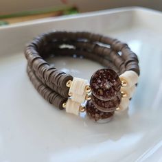 Adjustable Brown Stackable Jewelry, Adjustable Stackable Brown Jewelry, Adjustable Brown Stretch Bracelet, Brown Beaded Heishi Bracelets, Brown Heishi Beads Bracelets Gift, Brown Heishi Beads Bracelet For Gift, Brown Heishi Beaded Jewelry, Adjustable Brown Heishi Beads Bracelets, Adjustable Brown Heishi Beads Bracelet