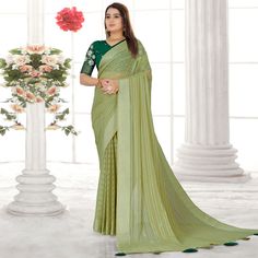 Pista Green colored saree is made from chiffon fabric which is highlighted with beautiful zari weaving striped pattern as shown. comes along with unstitched sequins embroidered net blouse which you can customise as per your design/style. Occasion - You can wear this saree for festive and functions, outing and get-together. Note:- the actual product may differ slightly in color and design from the one illustrated in the images when compared with computer or mobile screen. Measurements: Saree : Chiffon : 5.5 Mtrs Blouse : Chiffon : 0.8 Mtr Material: Chiffon Stitch Type: Unstitched Country of Origin: India Care Guide: Dry Clean Semi-stitched Chiffon Saree With Cutdana, Green Georgette Saree With Traditional Drape, Green Georgette Saree In Traditional Drape, Traditional Green Georgette Saree, Semi-stitched Green Blouse Piece With Sheer Dupatta, Designer Cutdana Chiffon Saree, Designer Chiffon Saree With Cutdana, Green Chiffon Saree With Unstitched Blouse, Party Green Dupatta With Zari Weaving