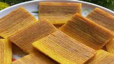 several pieces of cornbread on a white plate