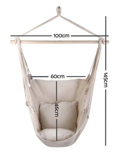 a white hanging chair with measurements for the size and width, along with an extra cushion