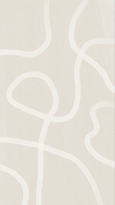 a white wallpaper with curved lines on it