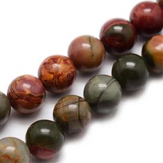 Natural Picasso Jasper Beads, Round, Dark Red Multi Color. Semi-Precious Gemstone Beads for Jewelry Making. Size: 8mm Diameter, Hole: 1mm; approx. 48pcs/strand, 15" inches long. Material: The Beads are Genuine Picasso Jasper Stone. Polished Finish. Picasso Jasper Properties: This Stone is Believed to Bring Clarity of Mind, Sharp Thinking and Promotes Inner Clarity. Picasso Jasper also Reminds Us to Celebrate and Appreciate Life, by Bringing Optimism in One's Life. Images are for reference purpos Memory Wire Wrap Bracelets, Picasso Jasper, Wire Wrapped Bracelet, Jewelry Making Project, Large Hole Beads, Jewelry Beads, Jasper Beads, Rhinestone Bead, Polymer Clay Beads