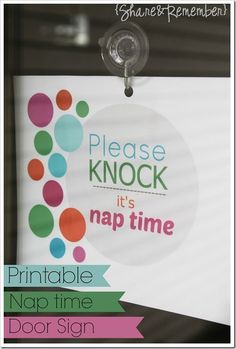 a sign that says please knock it's nap time next to a door hanger