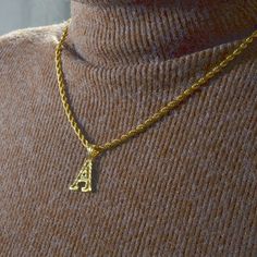 Make a statement with an A to Z Gold Letter Charm. This riveted gold charm offers a unique way to personalize your outfit. PVD Gold Plating ensures a long-lasting finish. Rope Chain Width: 3mm Pendant Size: 20mm Letters Necklace, Initials Necklace, Letter Jewelry, Gold Rope Chains, Gift Girlfriend, Initial Pendant Necklace, Personalized Pendant, Letter Charms, Letter Pendants