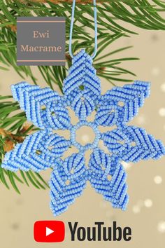 an ornament hanging from a christmas tree with the words ewi macrame on it