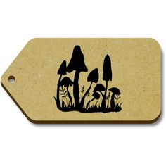 a wooden tag with an image of mushrooms on the side and grass in the middle